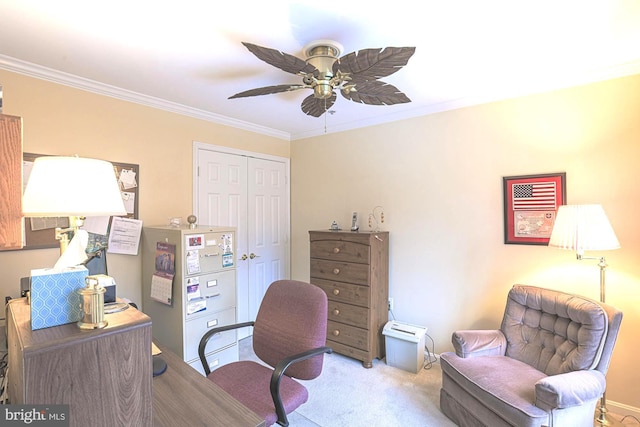 carpeted home office with ornamental molding and ceiling fan