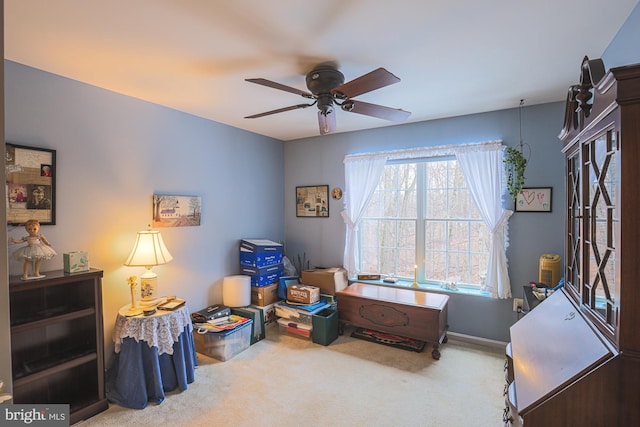 miscellaneous room featuring carpet floors and ceiling fan