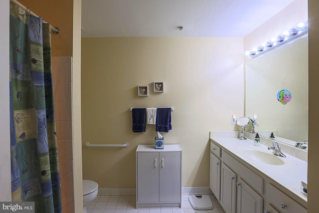 bathroom with walk in shower, tile patterned floors, toilet, and vanity