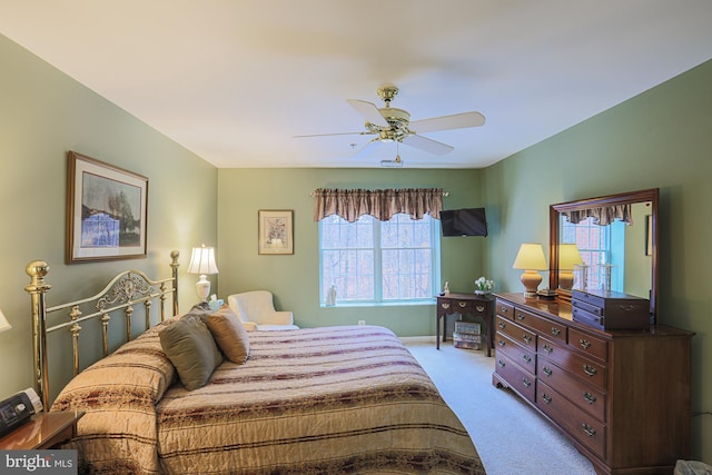 bedroom featuring ceiling fan and light colored carpet