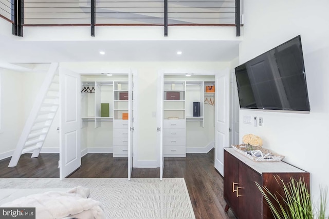 unfurnished bedroom featuring dark wood-type flooring and a closet