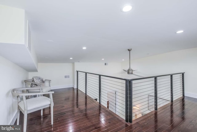 hall with dark hardwood / wood-style floors