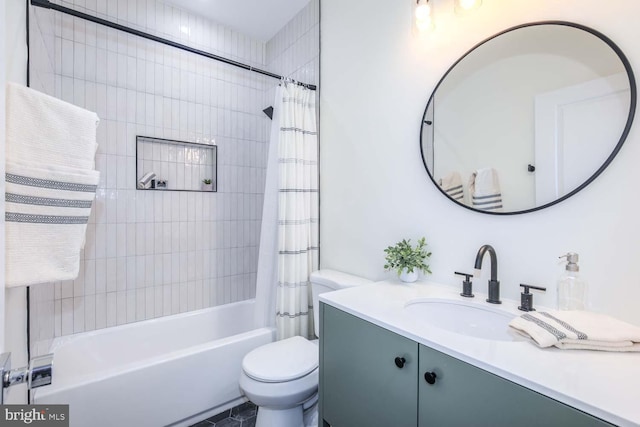 full bathroom featuring shower / bath combination with curtain, vanity, and toilet