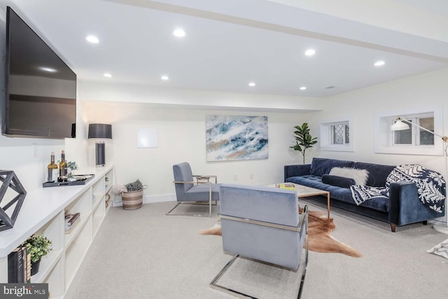 living room featuring light colored carpet