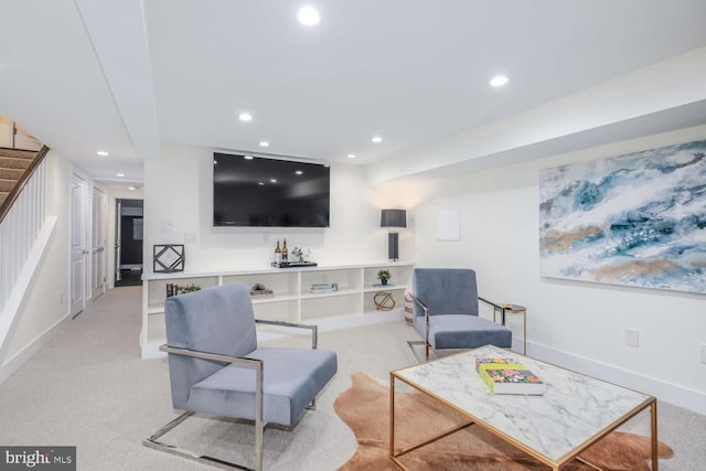 living room featuring light carpet