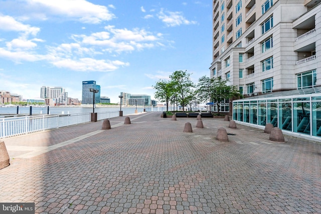 view of home's community with a water view