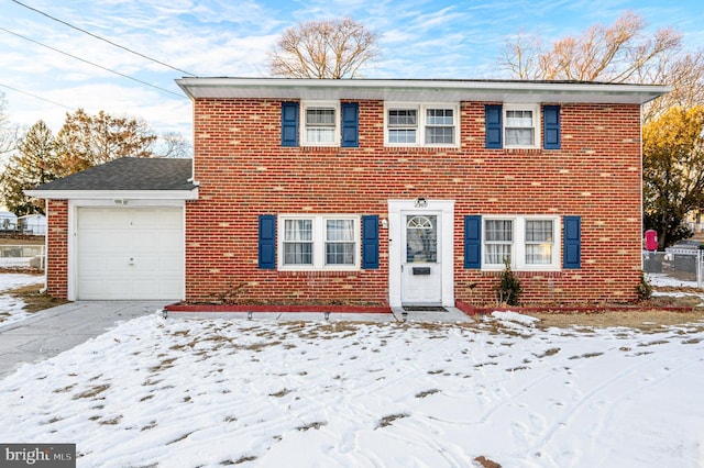 view of front of property with a garage