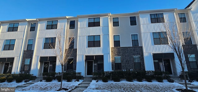 view of snow covered property