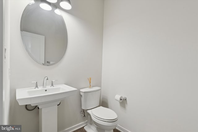 bathroom featuring toilet