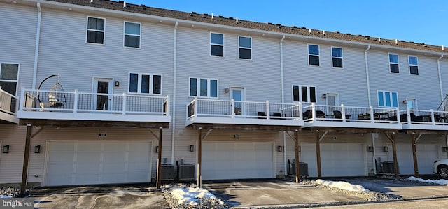 back of property with central AC unit