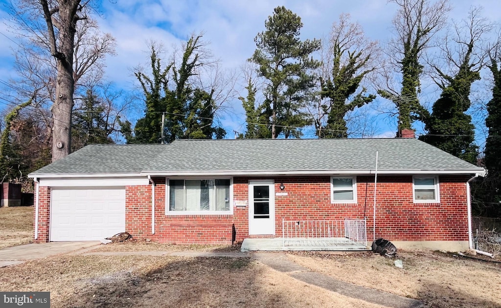 single story home with a garage