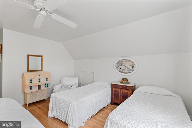 bedroom featuring vaulted ceiling, ceiling fan, and light hardwood / wood-style floors