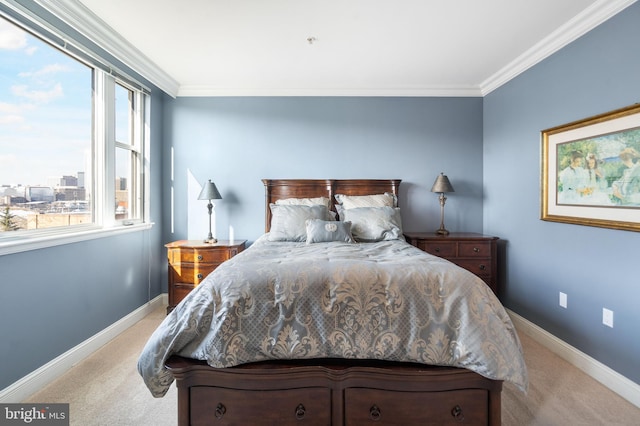 bedroom featuring ornamental molding, carpet floors, and multiple windows