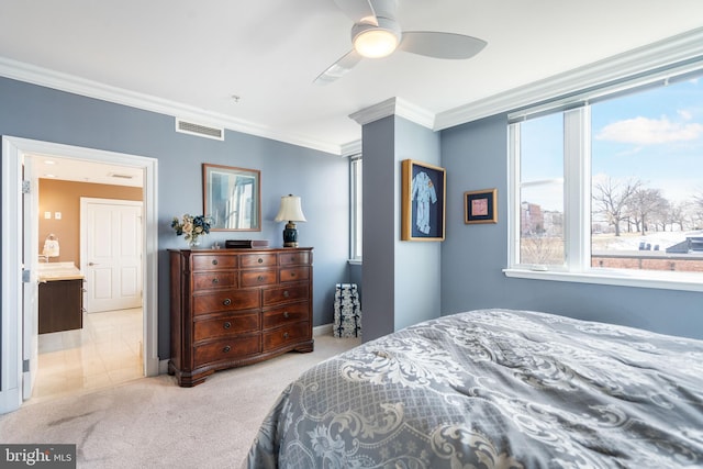 bedroom with crown molding, light carpet, and ceiling fan