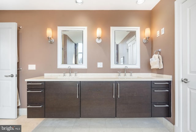 bathroom featuring vanity and tile patterned flooring