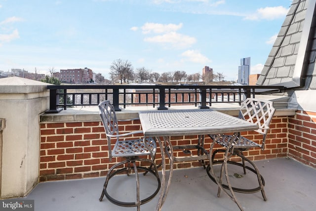 view of patio / terrace featuring a balcony