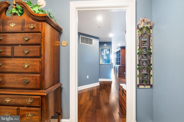 corridor with dark wood-type flooring