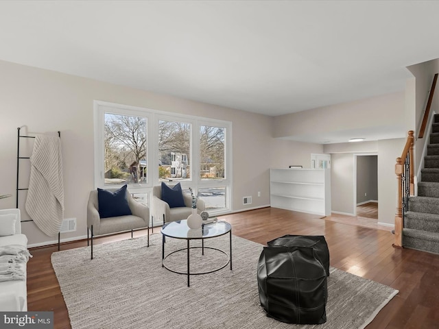 living room with dark wood-type flooring