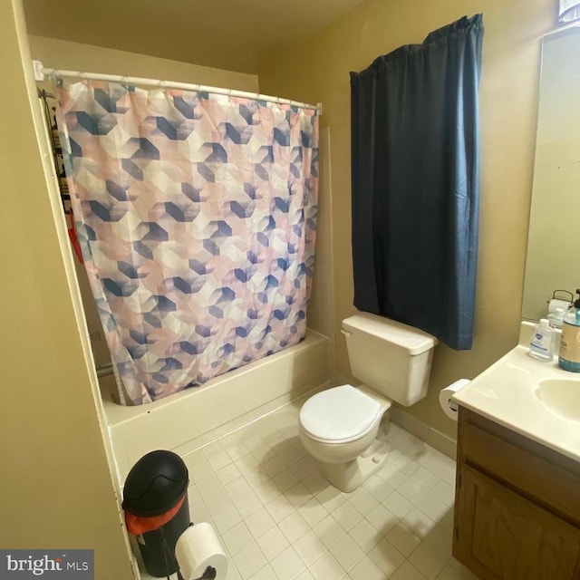 full bathroom featuring vanity, shower / tub combo, and toilet