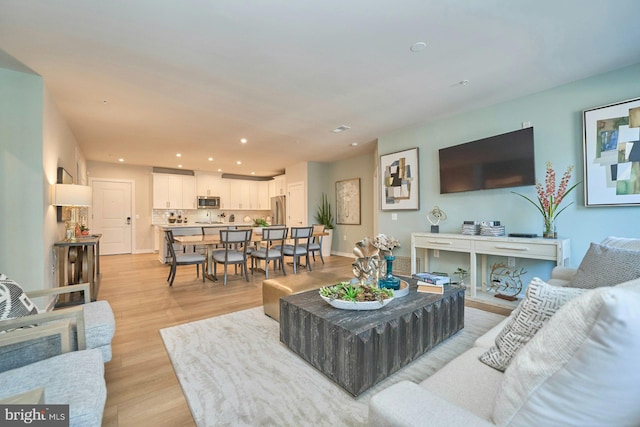 living room featuring light wood-type flooring