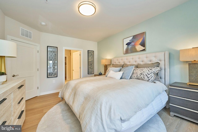 bedroom featuring light wood-type flooring