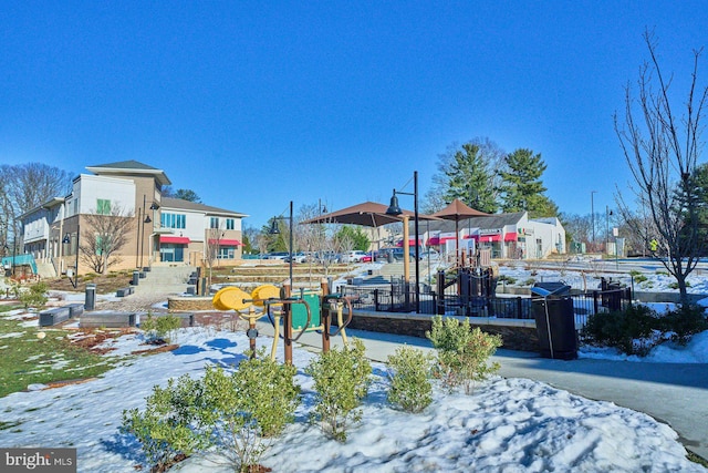 view of home's community featuring a playground