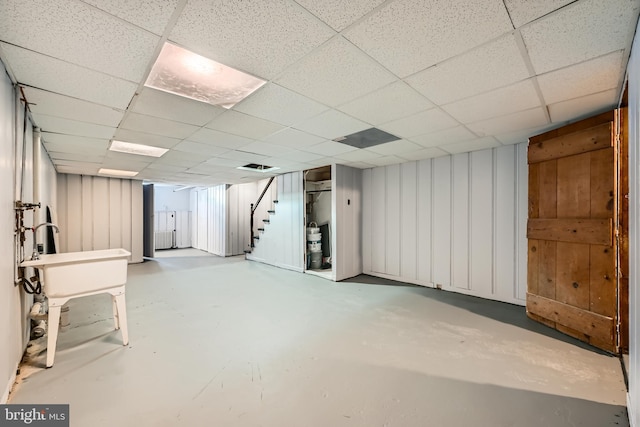 basement with a drop ceiling