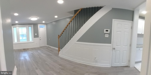 entrance foyer featuring light hardwood / wood-style floors