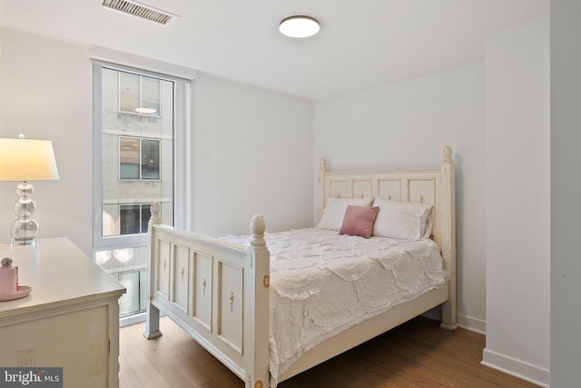 bedroom featuring light wood-type flooring