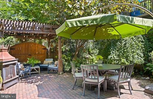 view of patio / terrace featuring a pergola