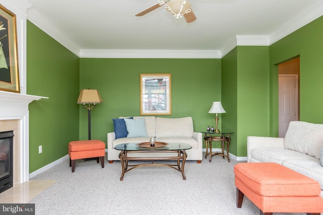 carpeted living room with ornamental molding, a fireplace, and baseboards