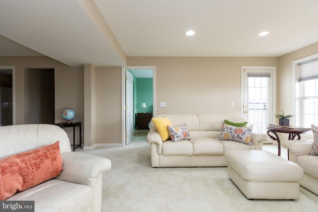 living room with carpet, baseboards, and recessed lighting