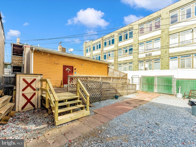 rear view of house with a deck