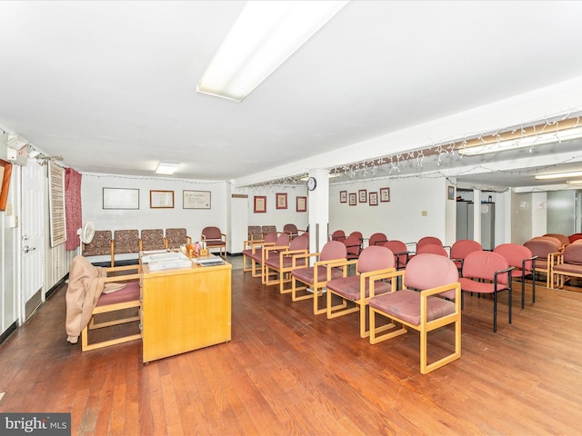 dining space featuring wood-type flooring