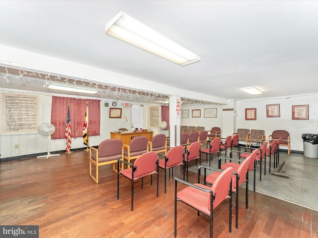 dining space with hardwood / wood-style flooring