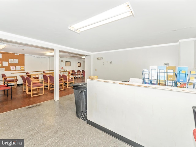 interior space featuring crown molding