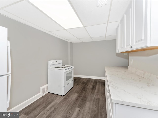 laundry room featuring dark wood-type flooring