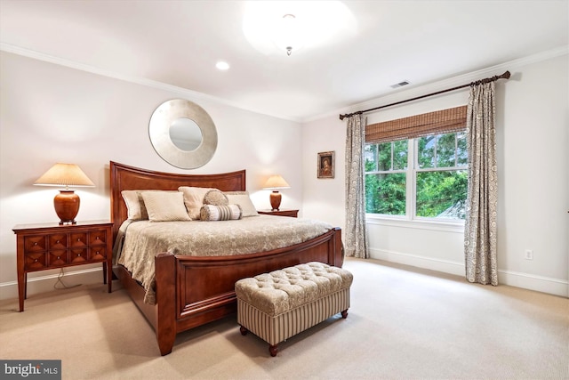 carpeted bedroom featuring ornamental molding