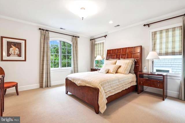 carpeted bedroom featuring ornamental molding