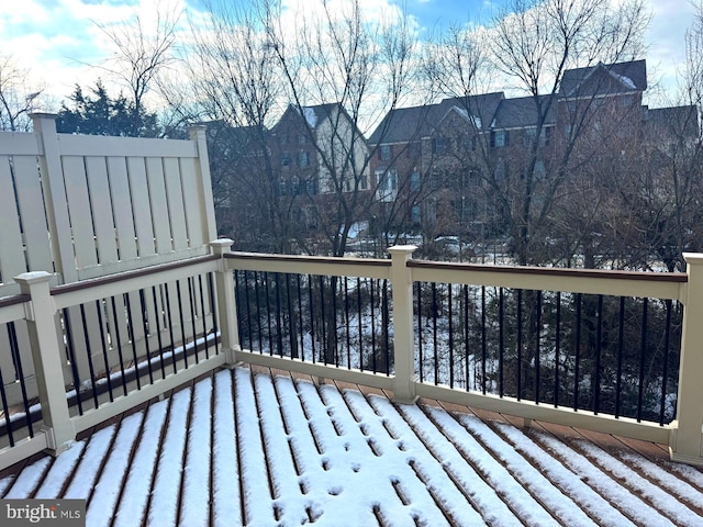 view of snow covered deck