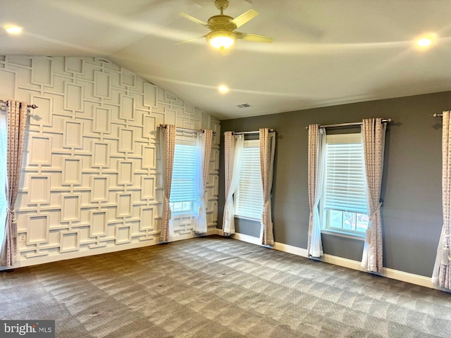 interior space with vaulted ceiling and ceiling fan