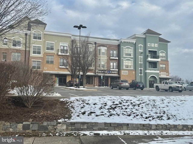 view of snow covered property