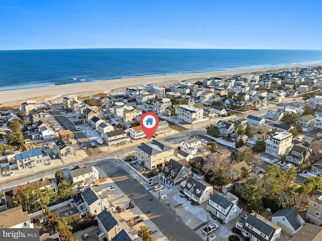 aerial view featuring a beach view and a water view