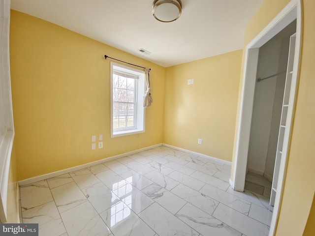 unfurnished bedroom with a closet