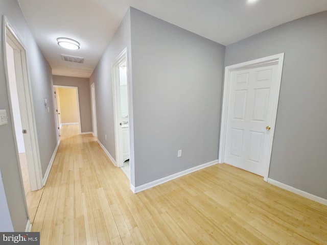 hall featuring light hardwood / wood-style floors