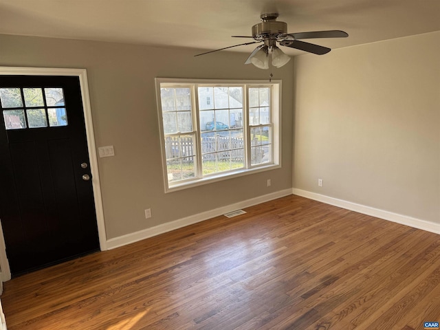 foyer with hardwood / wood-style flooring and ceiling fan