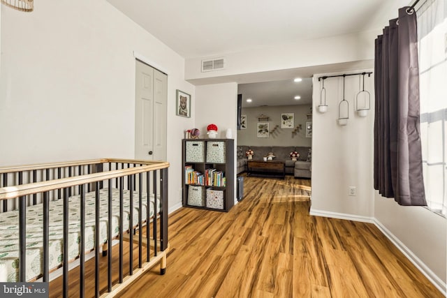 hall featuring hardwood / wood-style flooring