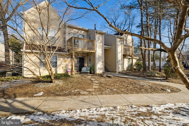 view of property with a balcony