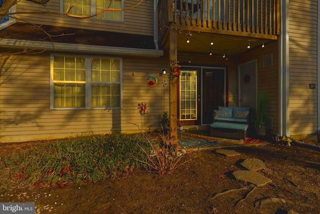 property entrance with a balcony