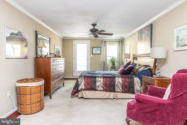 carpeted bedroom featuring crown molding, a textured ceiling, and ceiling fan